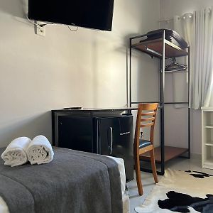 Quarto confortável para quatro pessoas