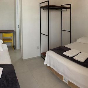 Quarto para três pessoas